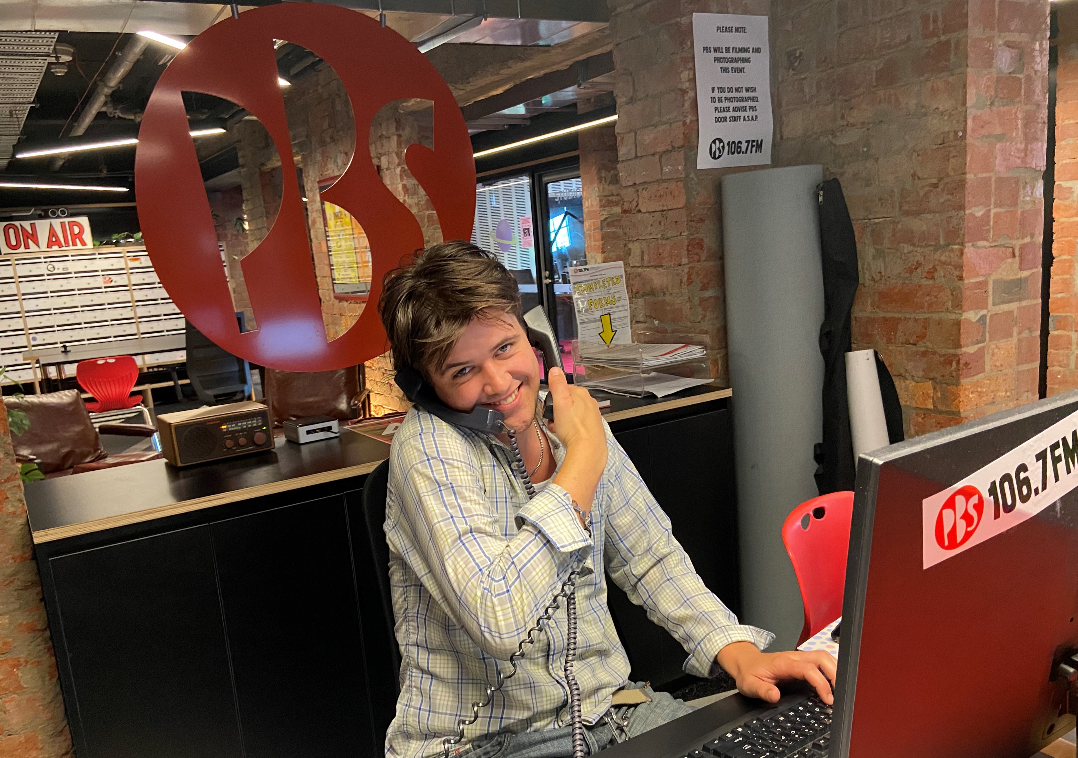 Front desk volunteer answers the phones